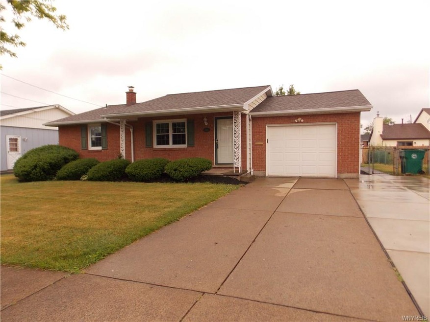 Brick front with covered porch and newly added con