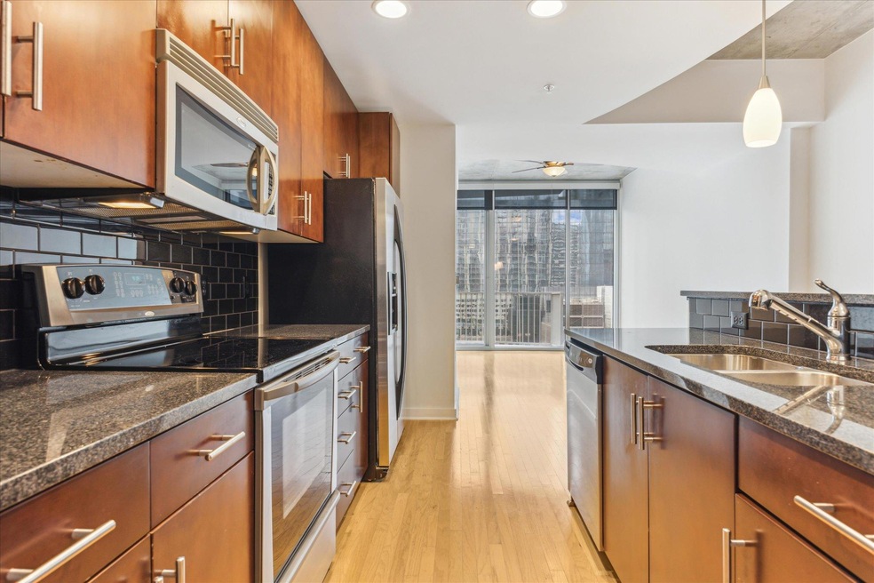 Kitchen featuring stainless steel appliances, a s