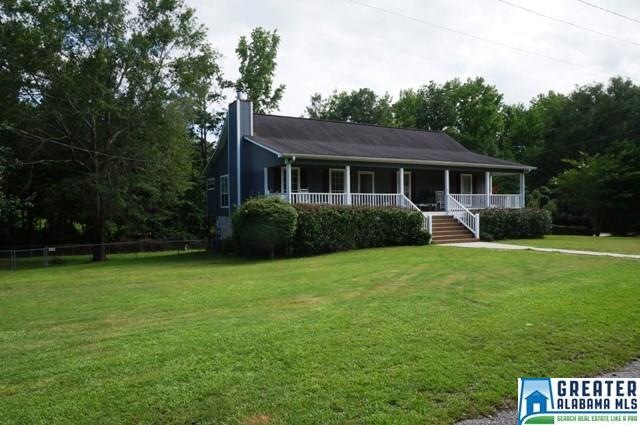 Has huge corner lot. back wooded view.
