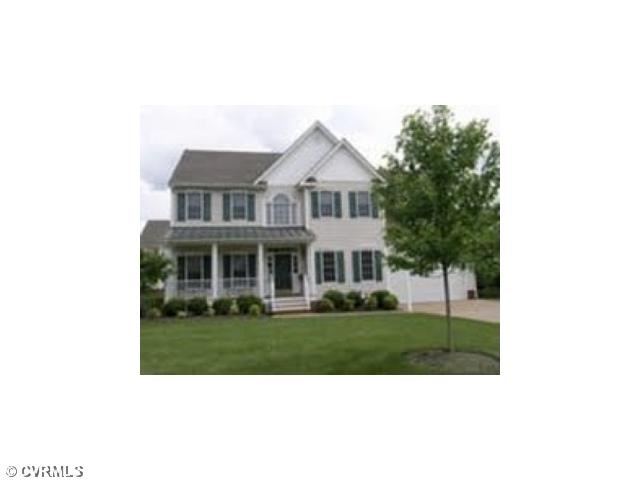Exterior Front - Front yard has professional lands