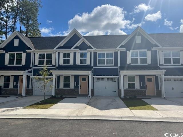 View of front of house featuring a garage