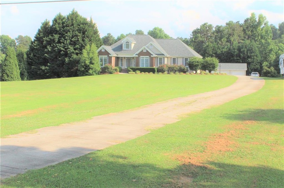 3.47 acres with a deep off the road setting. RV ho