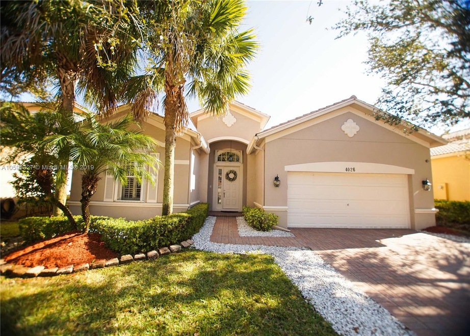 Beautiful Curb Appeal and Paved Driveway.