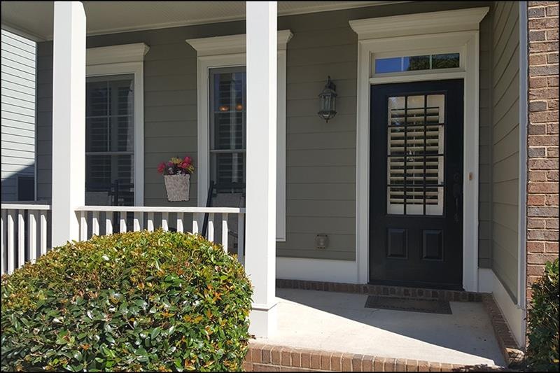 ROCKING CHAIR FRONT PORCH (room for four rocking chairs or a hanging porch swing). GOT KIDS?  VILLAGE GROVE NEIGHBORHOOD IS LOCATED IN THE NORTH GWINNETT (EXCELLENT) SCHOOL CLUSTER.