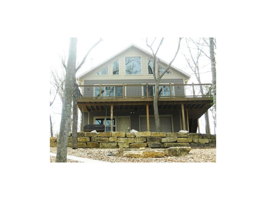 Hardi siding, trex deck, stone landscaping all for
