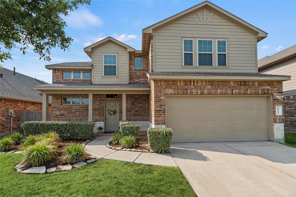 Welcome home to 23723 Rivage Ridge Drive of Katy's