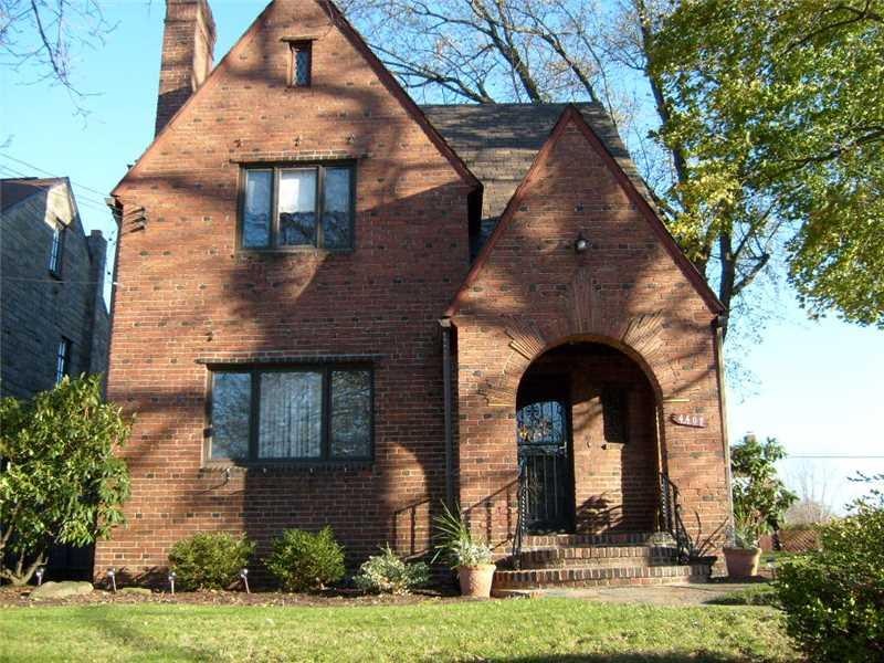 Exterior Front. Striking brickwork defines this st