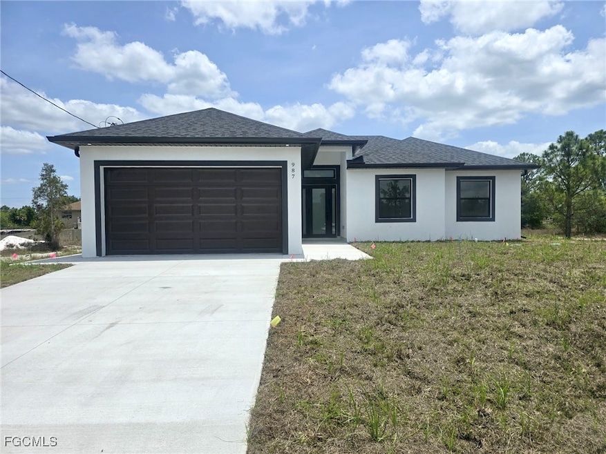987 Edgerton Ave, Lehigh Acres, FL 33974 - photo 1