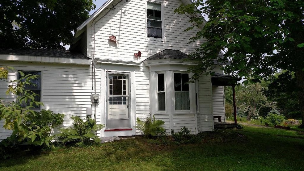 This solid farmhouse has been...