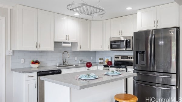 Beautifully renovated kitchen with modern tiled ba