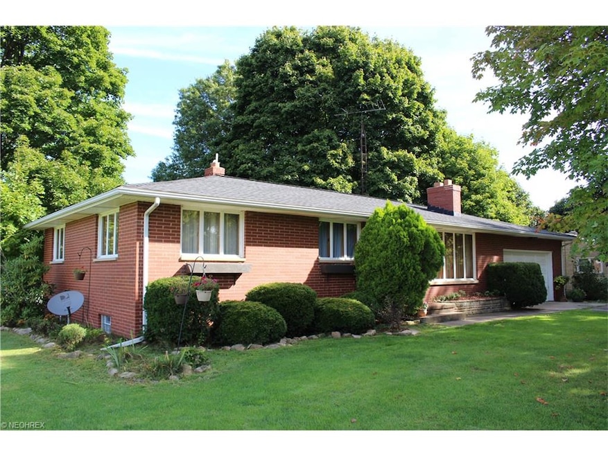 Beautifully maintained three bedroom brick ranch i