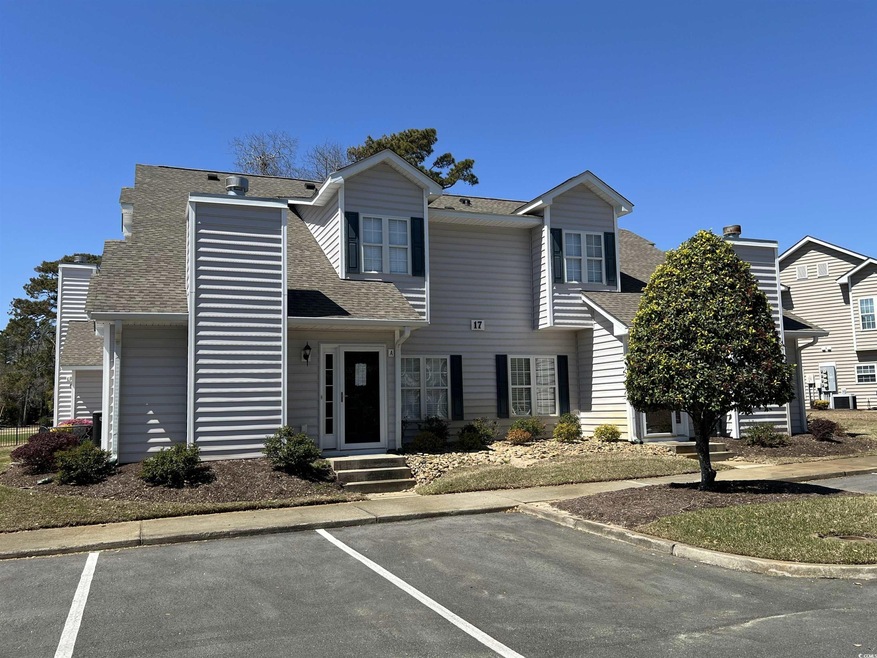 Traditional-style house featuring uncovered parkin