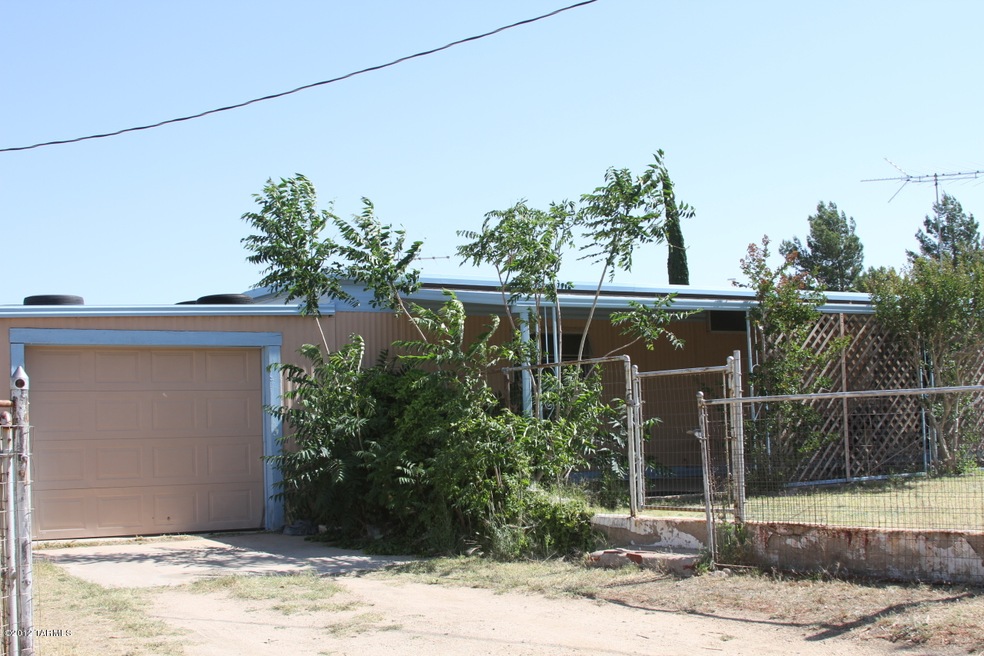 Outside of house with garage