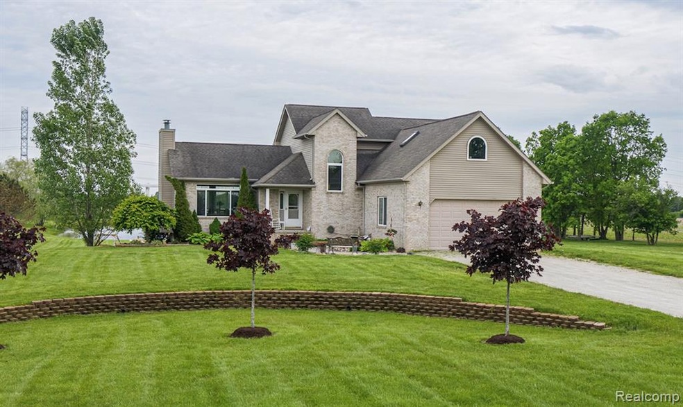 Welcome Home to 10151 Meskill Road on over 7 acres