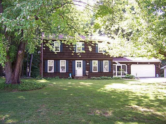 Exterior Front. Great curb appeal with stained ced