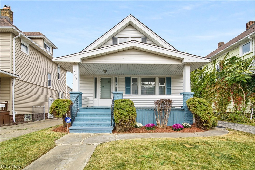 Bungalow featuring covered porch