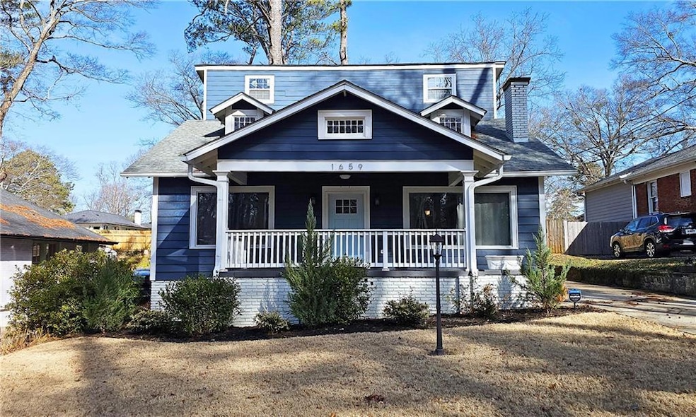 View of front of property with covered porch