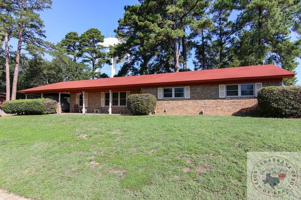 333 W Greenfield Dr, Wake Village, TX 75501 - photo 1