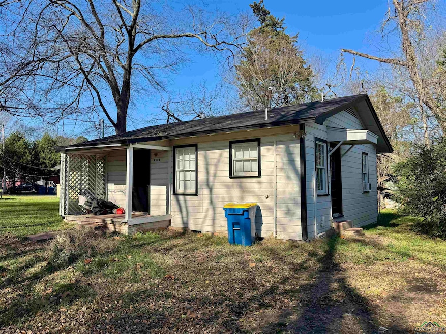 Exterior space with a front lawn