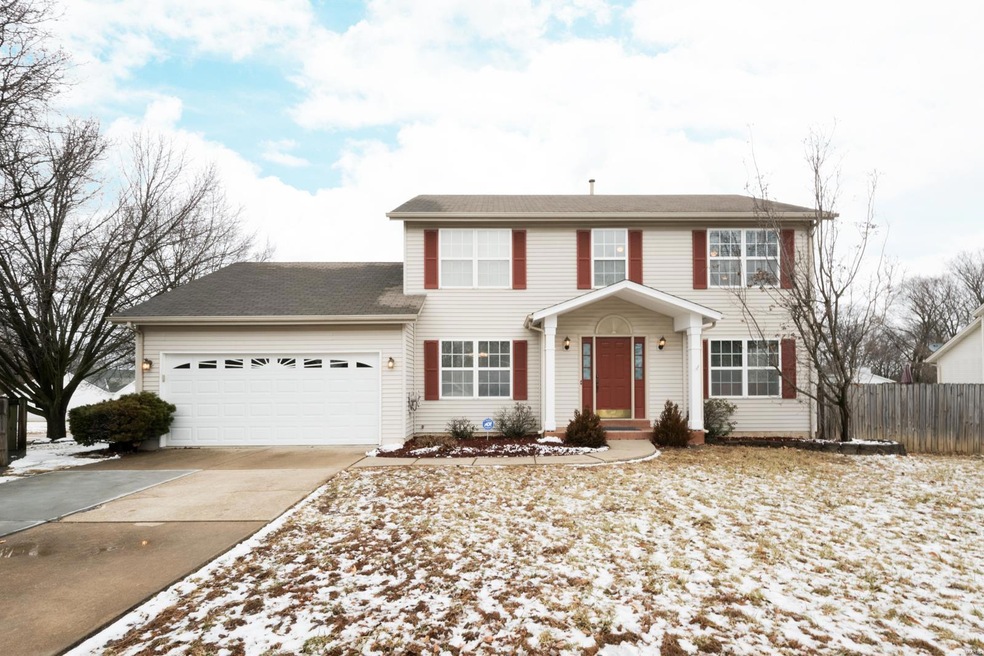 Lovely two-story on a private street with a level,