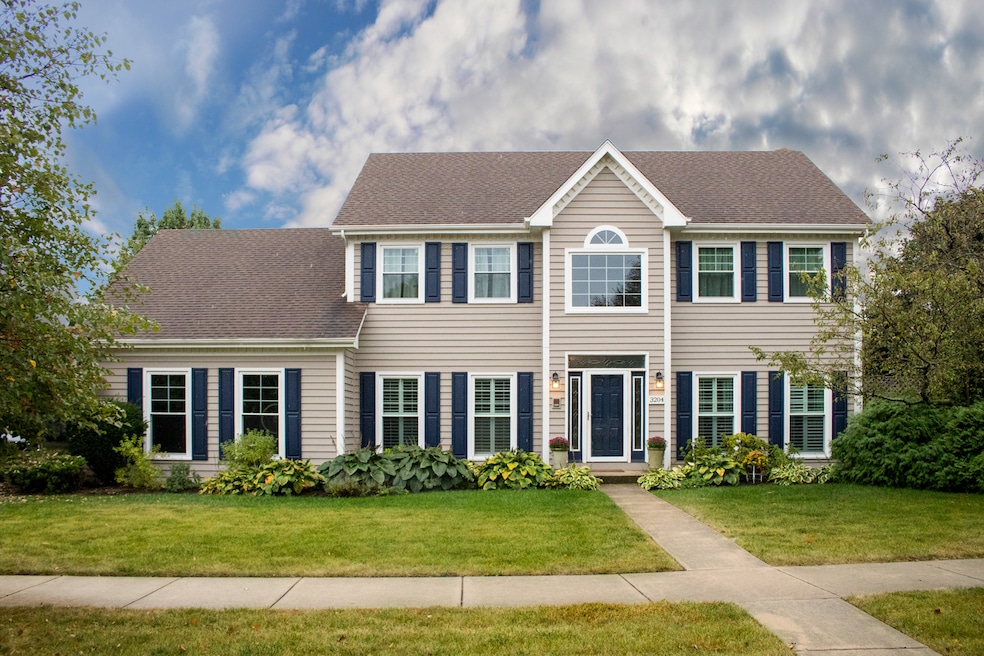 Warm & inviting colonial home with 10.5ft ceilings