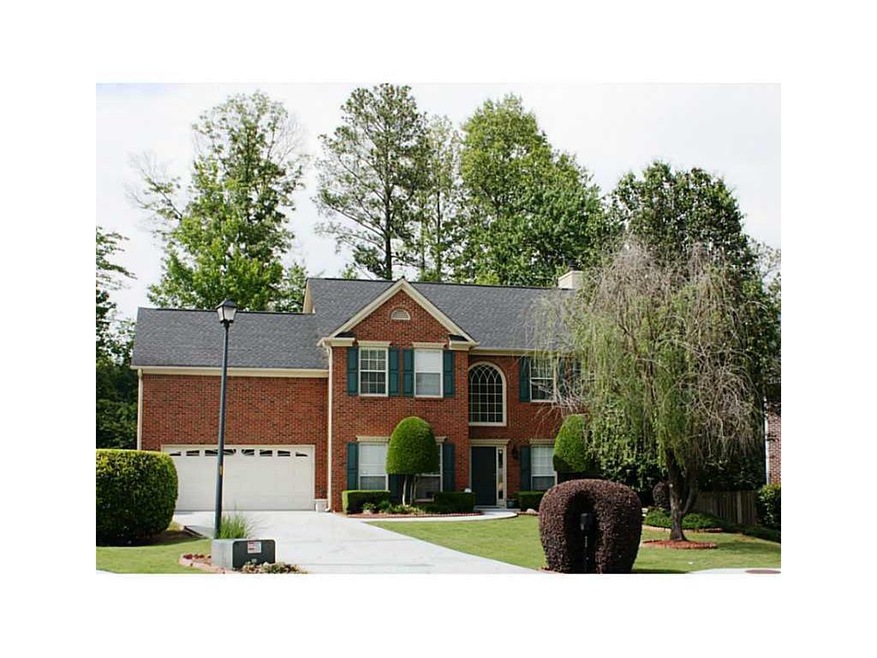 Exterior Front. Front of house professionally land