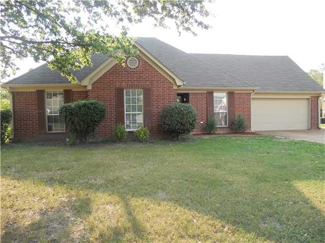 Brick exterior.Attractive paint on wood trim and s