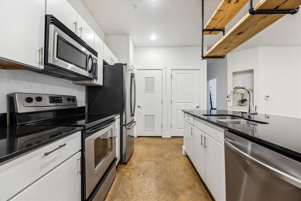 Kitchen featuring stainless steel appliances, vis