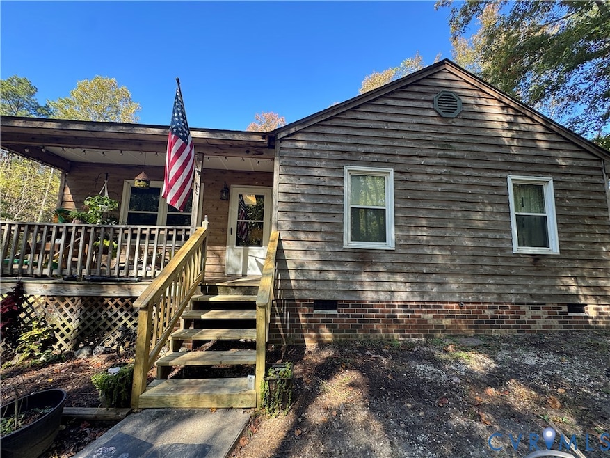 View of front of property with crawl space