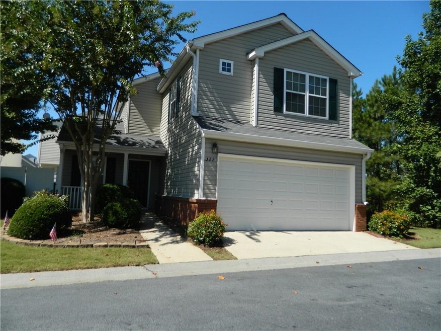 Professionally landscaped 3/2.5 brick and frame.