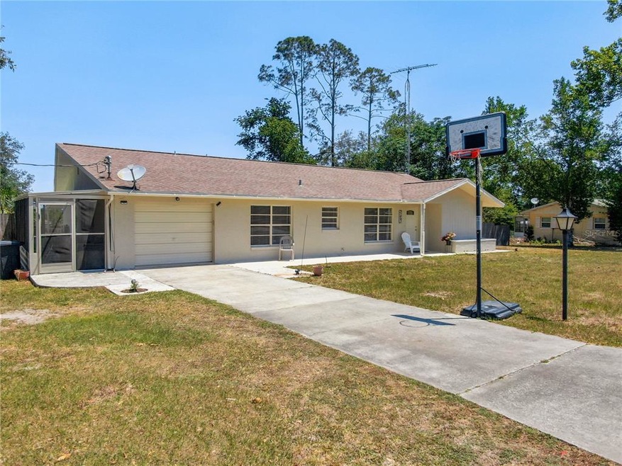 21491 SW Honeysuckle St, Dunnellon, FL 34431 - photo 1