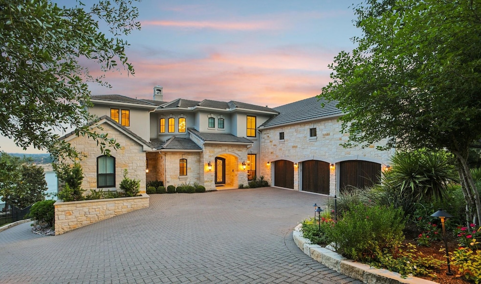 View of front of property with stone siding, curv