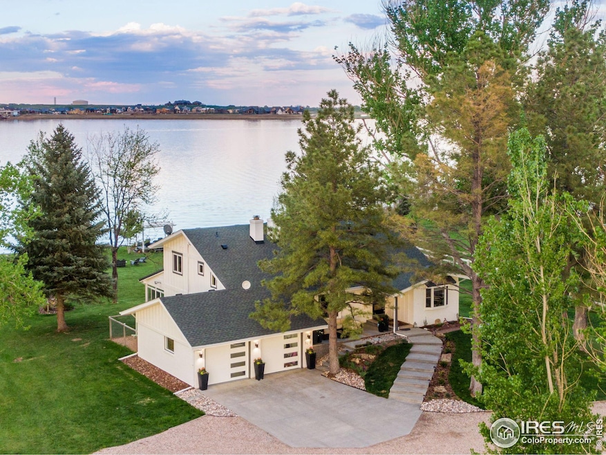 This is an ultra rare lot with Lake and Mountain views, no HOA, no Metro Tax and right across the lake from Heron Lakes TPC Colorado