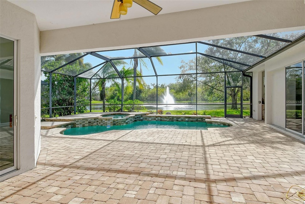 Gorgeous lake view from your private lanai and pool area