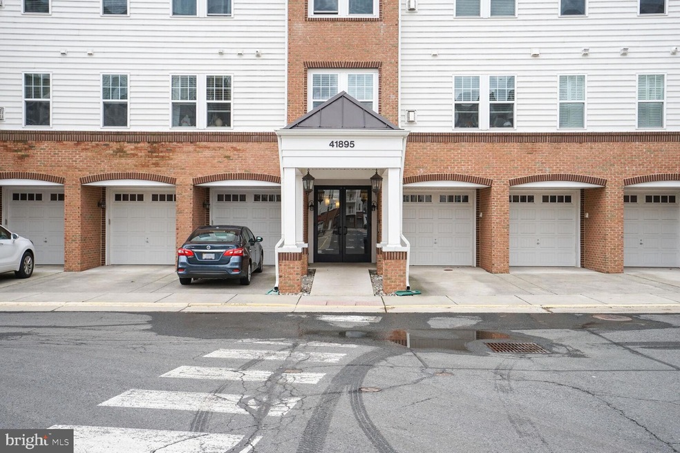 41895 Cathedral Valley Square unit A-303, Aldie, VA 20105 - photo 1