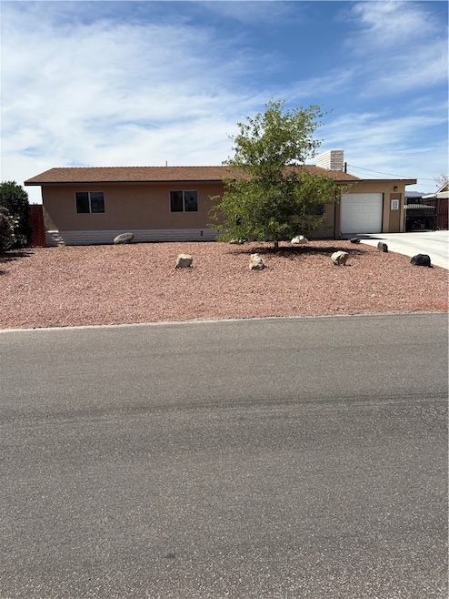View of front of house with an attached garage, dr