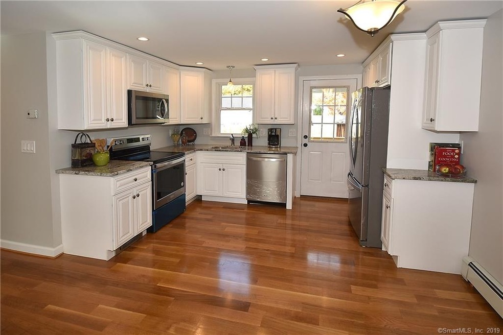 Gorgeous designer kitchen with granite counters an