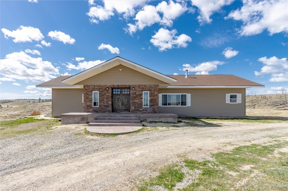 Spacious one level custom home with over 16 acres