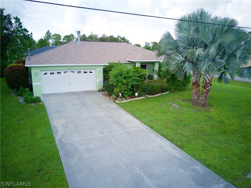 408 Parkdale Blvd, Lehigh Acres, FL 33974 - photo 1