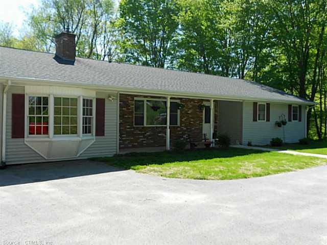 Exterior Front. Porch provides protection from wea