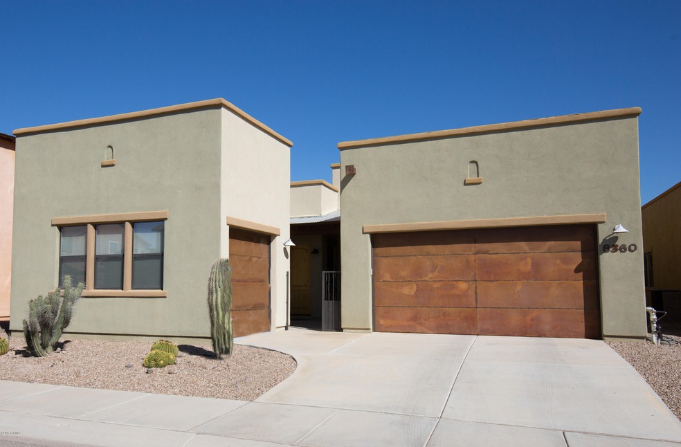 3 Car Garage w/Oxidized Steel Doors