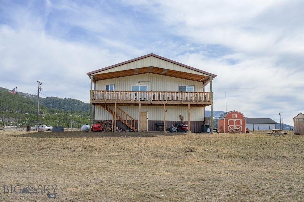 everse view of the home, front faces road with att