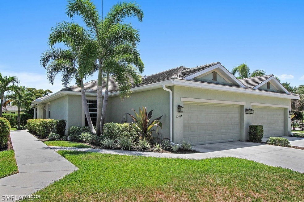 Lush landscaping, private side entrance