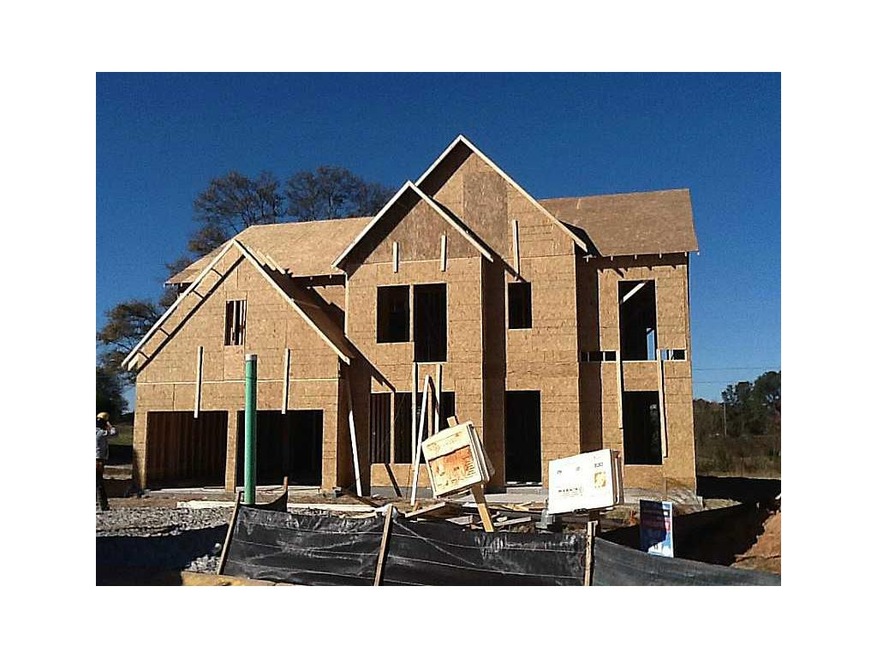 Exterior Front. Actual Home In Rough Plumbing Stag