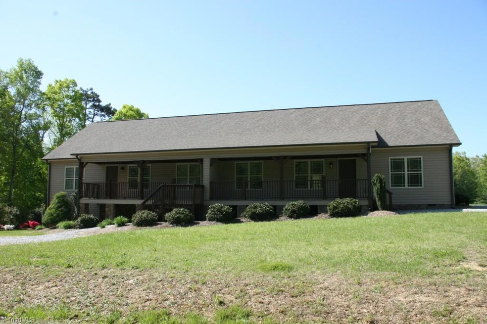 Front exterior with a covered front porch.