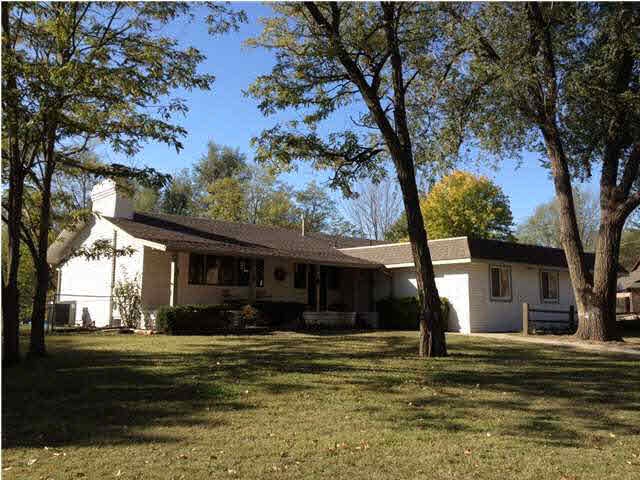Wonderful corner lot with trees, side-load garage,