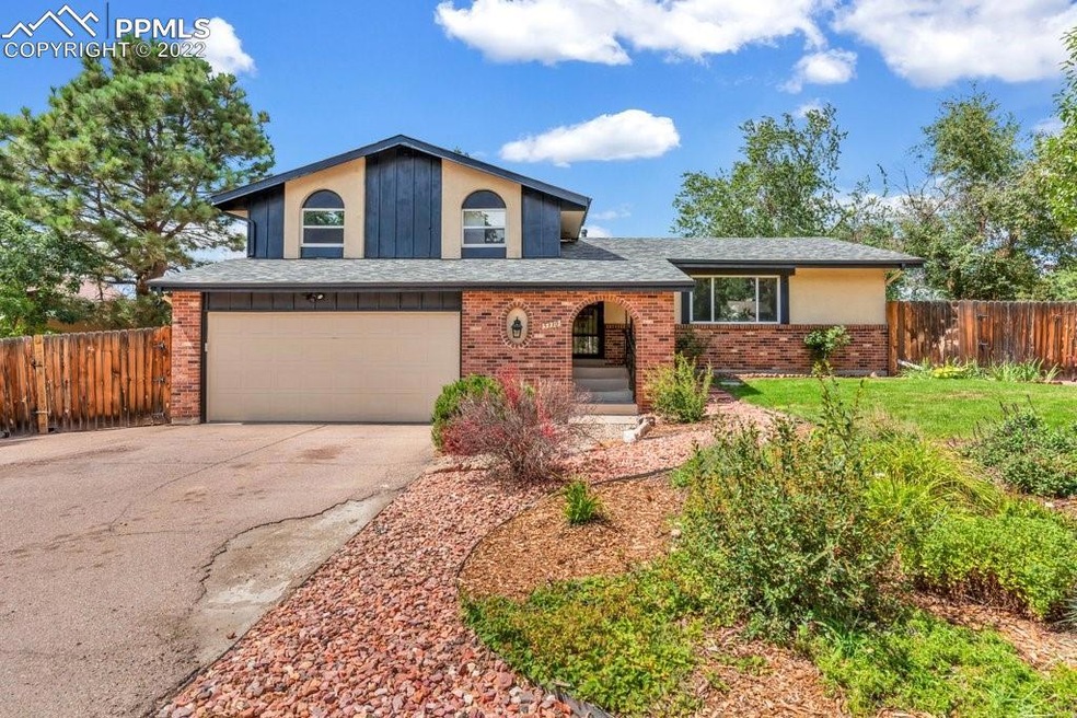 Beautiful brick and stucco with covered entry welc