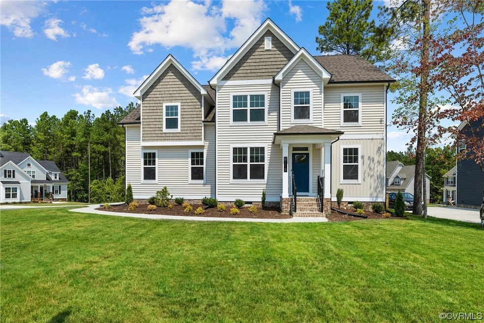 View of front of home featuring a front lawn