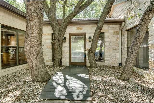Front door entry with trees