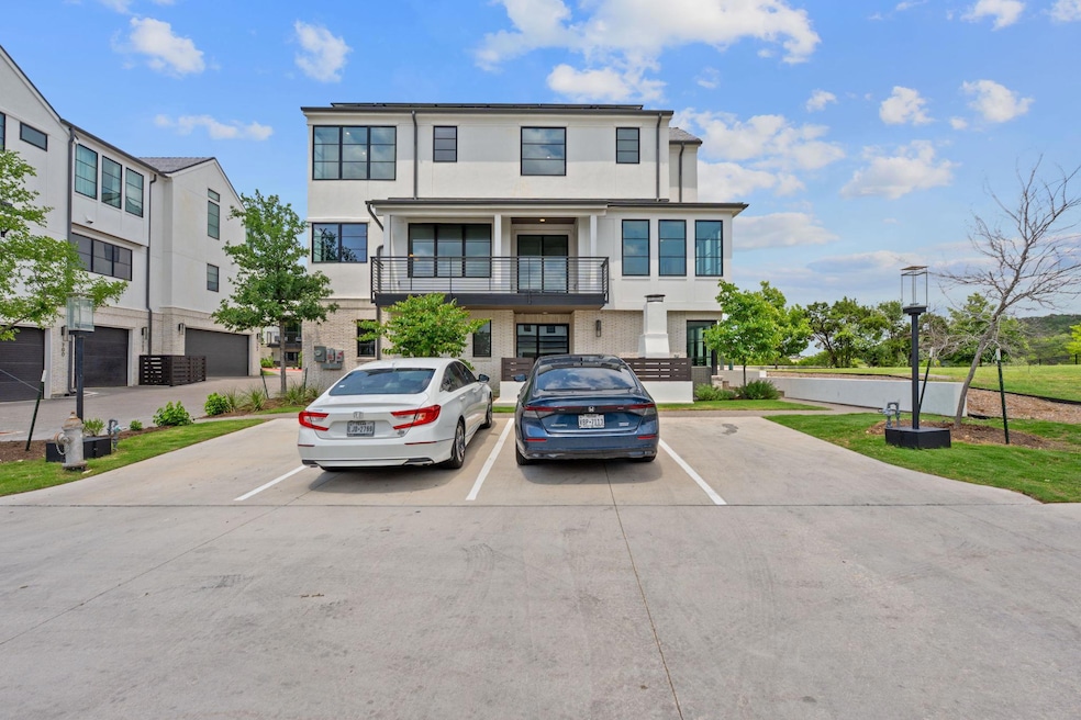 Townhome / multi-family property featuring uncove